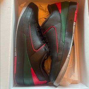 Jordan Black and Red Sneakers with Green Accents